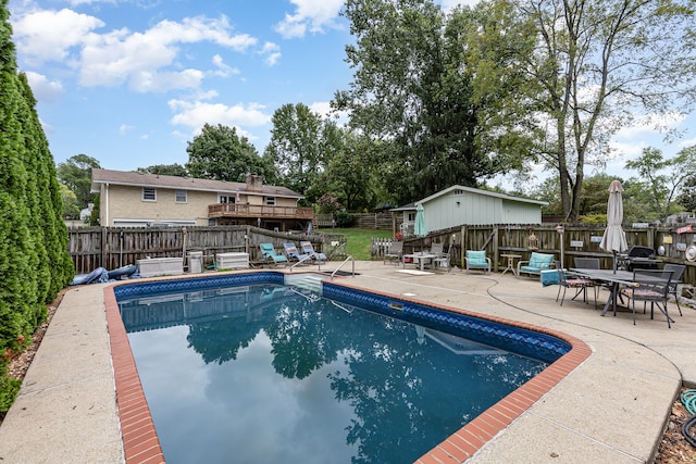 view of pool with a patio area