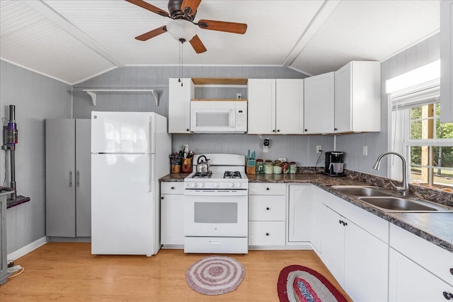 kitchen featuring ceiling fan, white cabinets, lofted ceiling, sink, and white appliances