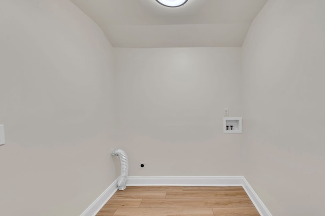 laundry room featuring hookup for a washing machine, hookup for an electric dryer, and light hardwood / wood-style flooring