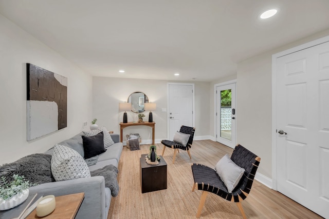 living room with light hardwood / wood-style floors