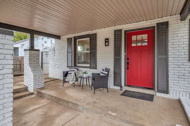 entrance to property with covered porch