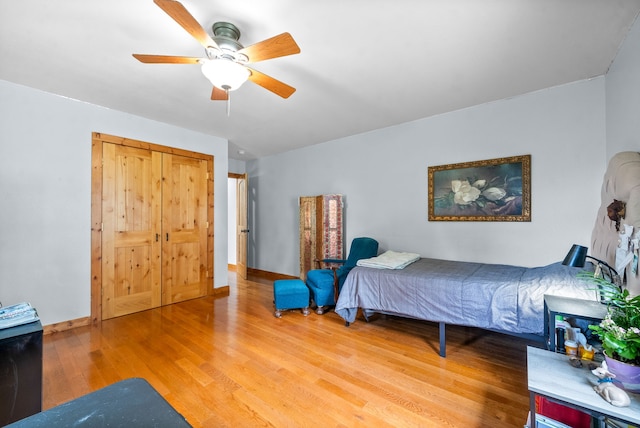 bedroom featuring ceiling fan and hardwood / wood-style floors