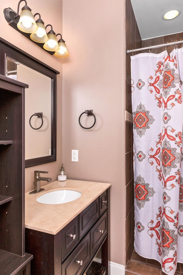 bathroom featuring vanity and a shower with curtain