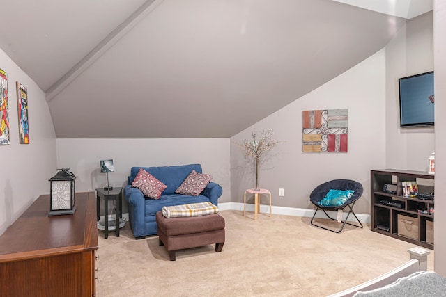 living room featuring carpet flooring and vaulted ceiling