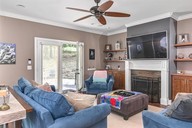 living room featuring crown molding and ceiling fan