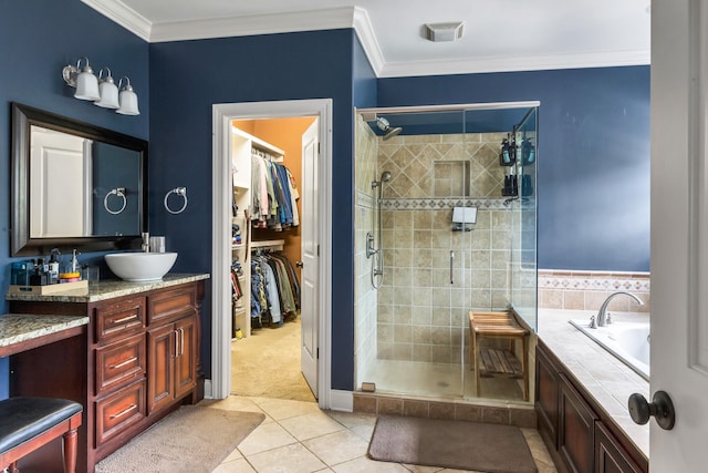 bathroom featuring crown molding, shower with separate bathtub, tile patterned flooring, and vanity