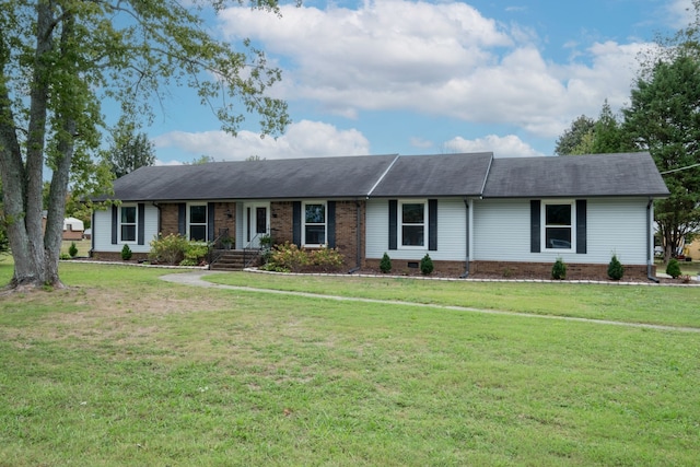 single story home with a front yard