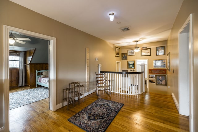 hallway featuring hardwood / wood-style flooring