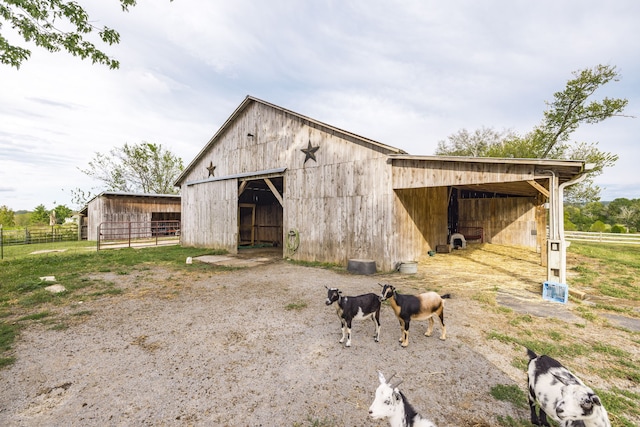 view of outbuilding featuring a rural view