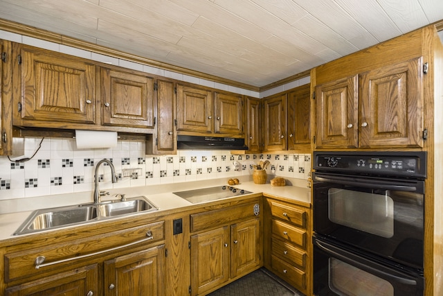 kitchen featuring black appliances, backsplash, crown molding, and sink