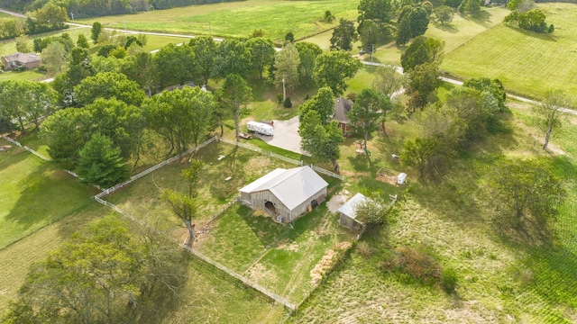 birds eye view of property featuring a rural view