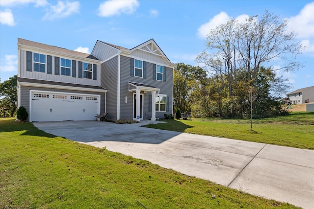 view of front of property with a garage and a front lawn