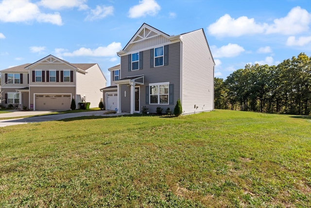 view of front of home featuring a garage and a front yard