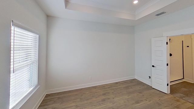 657 Gustaf Dr, Whites Creek, TN 37189 - unfurnished room featuring wood finished floors, baseboards, a tray ceiling, and recessed lighting
