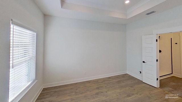 657 Gustaf Dr, Whites Creek, TN 37189 - unfurnished room featuring wood finished floors, a tray ceiling, baseboards, and recessed lighting