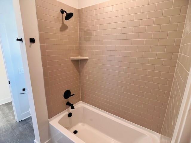 full bathroom with shower / tub combination and baseboards