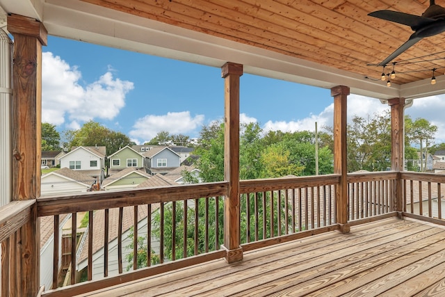 wooden deck featuring ceiling fan