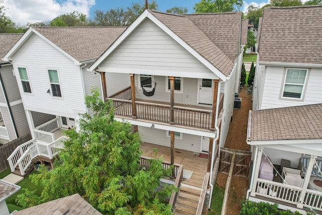 view of front of house featuring a balcony