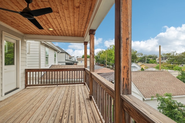 wooden terrace featuring ceiling fan