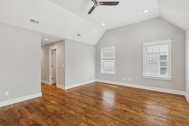 unfurnished room with lofted ceiling, hardwood / wood-style floors, and ceiling fan