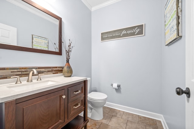 bathroom with decorative backsplash, tile patterned floors, crown molding, vanity, and toilet