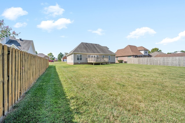 view of yard with a deck