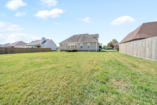 view of yard featuring a wooden deck