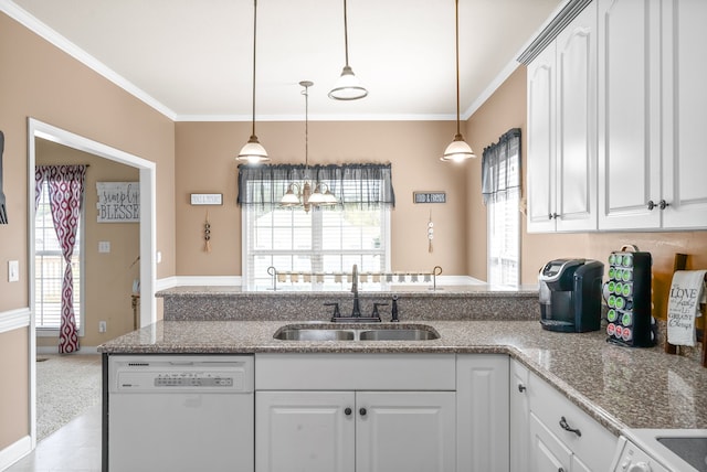 kitchen with crown molding, white cabinetry, sink, and white dishwasher