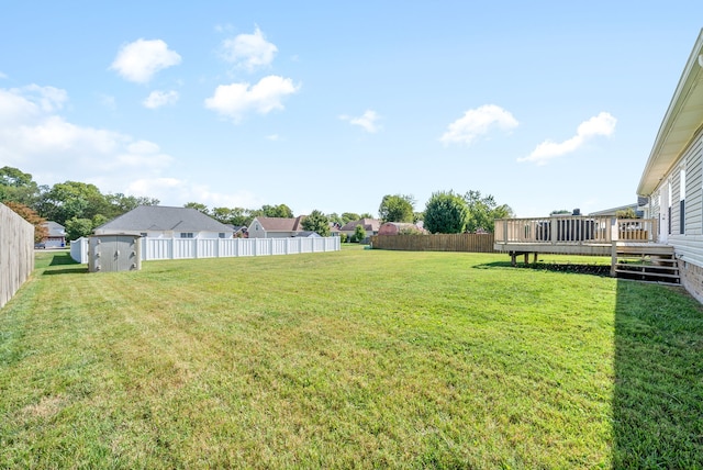 view of yard featuring a deck