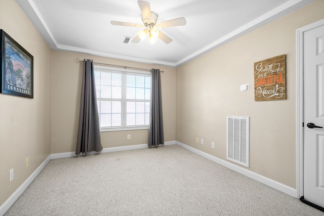 unfurnished room featuring ceiling fan and light colored carpet