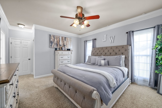 bedroom with multiple windows, crown molding, and ceiling fan