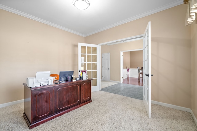 carpeted home office featuring ornamental molding and french doors