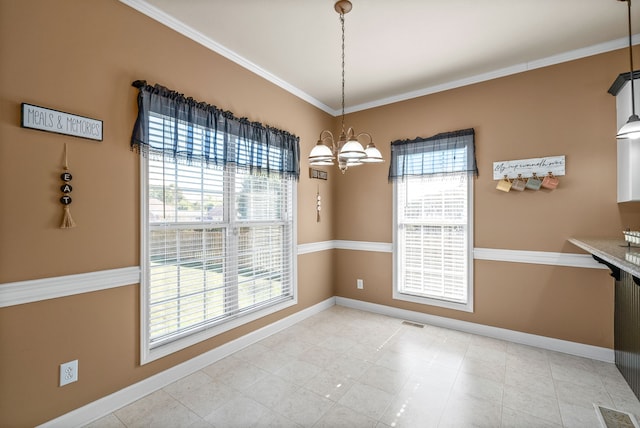 unfurnished dining area with light tile patterned floors, a chandelier, ornamental molding, and a healthy amount of sunlight