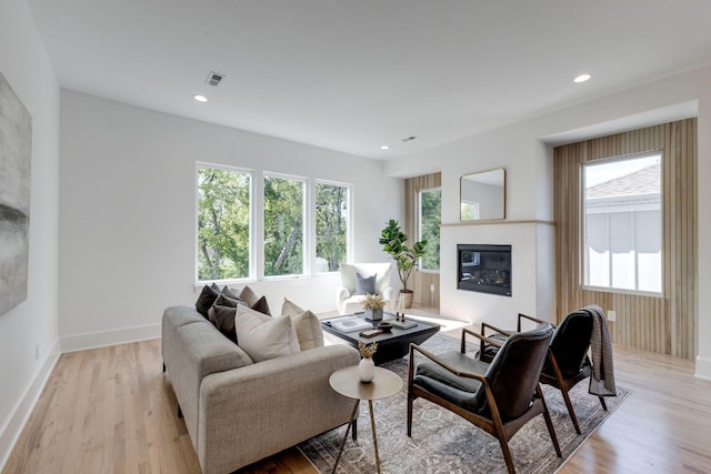 living room with light hardwood / wood-style floors