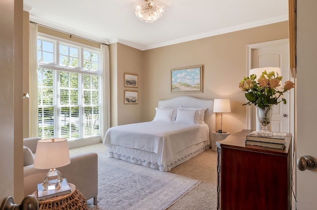 bedroom featuring light colored carpet and ornamental molding