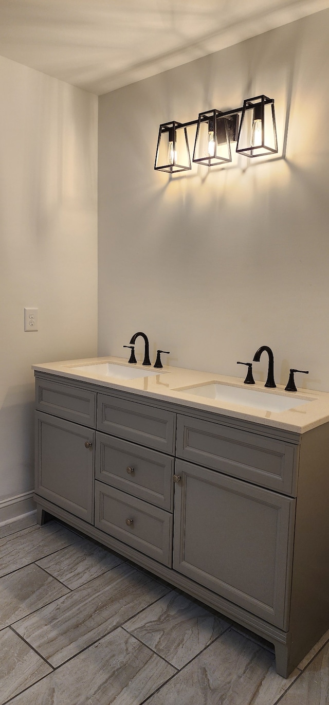 bathroom with wood-type flooring and vanity