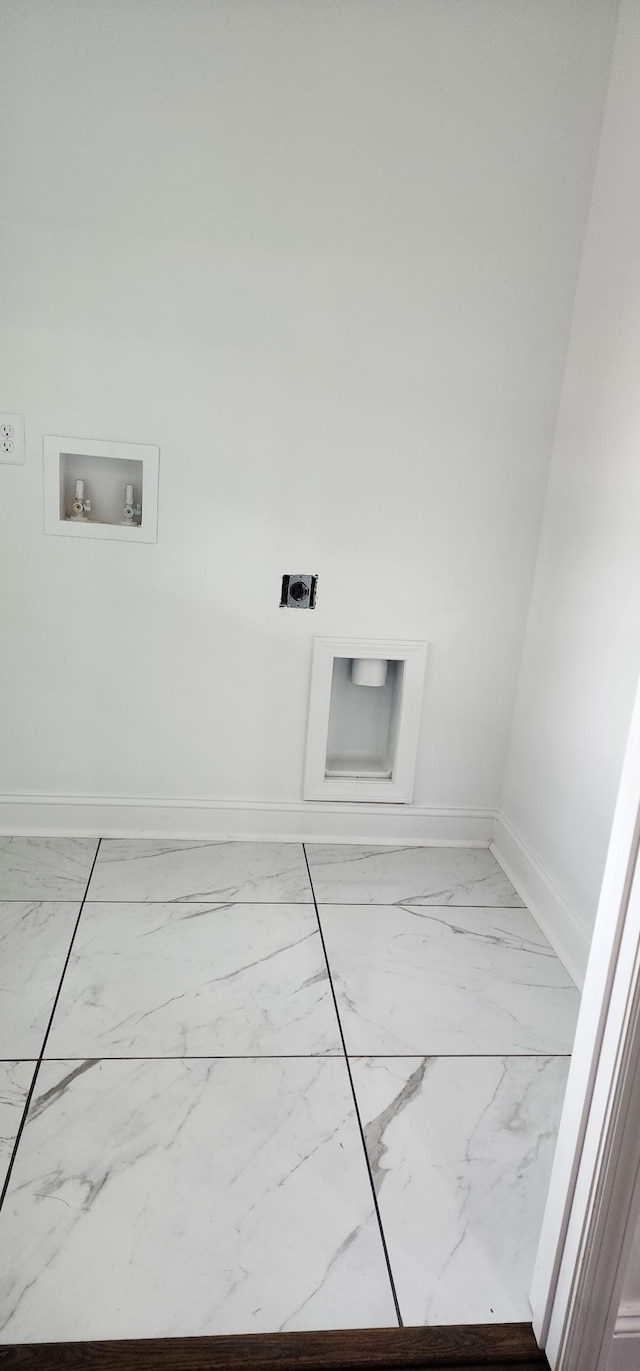 laundry room with washer hookup and electric dryer hookup