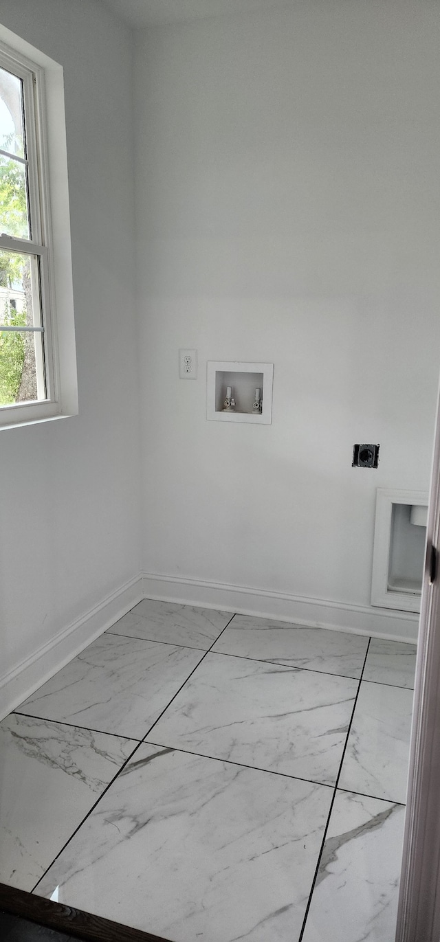 laundry area featuring washer hookup and electric dryer hookup