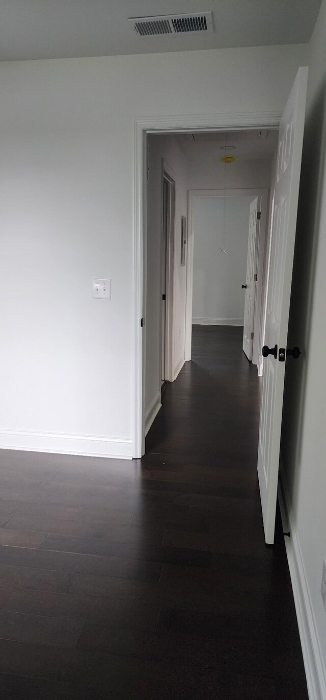 hall featuring dark hardwood / wood-style flooring