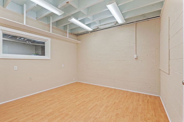 basement with wood-type flooring