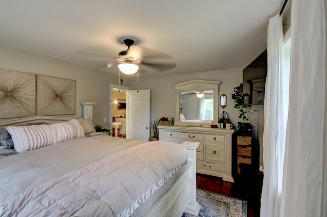 bedroom with ceiling fan and dark hardwood / wood-style floors