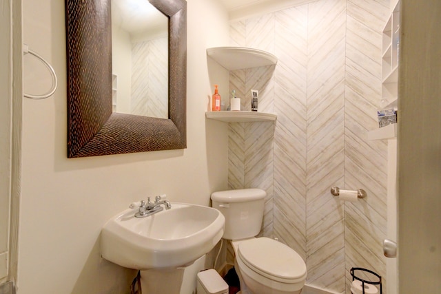 bathroom with toilet and sink