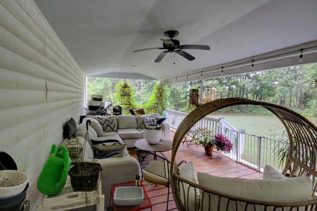 wooden deck featuring ceiling fan and an outdoor hangout area