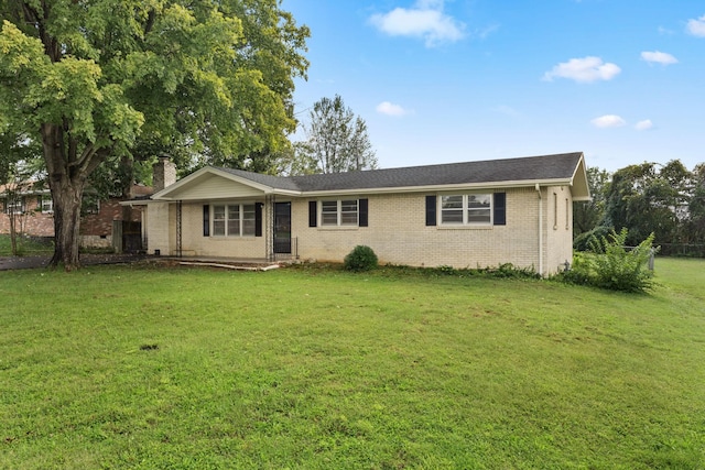 314 Robin Rd, Bowling Green, KY 42101 - ranch-style home featuring brick siding, a front lawn, and a chimney