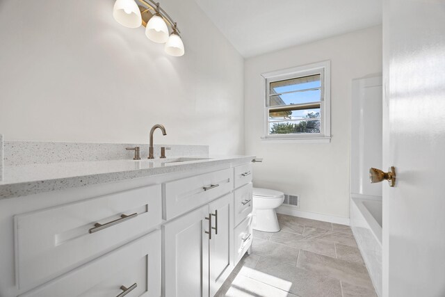 314 Robin Rd, Bowling Green, KY 42101 - full bathroom with visible vents, baseboards, a bathing tub, toilet, and vanity