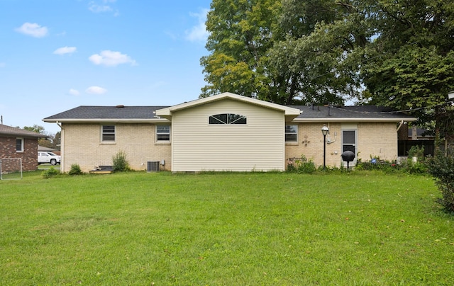 314 Robin Rd, Bowling Green, KY 42101 - rear view of property with a yard, brick siding, fence, and a shingled roof
