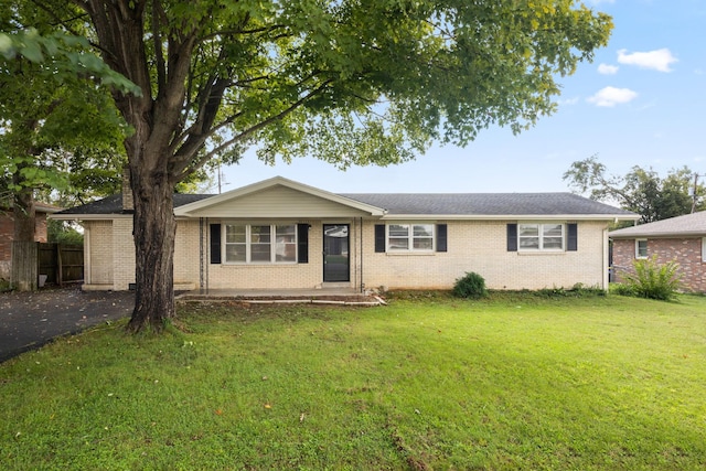 314 Robin Rd, Bowling Green, KY 42101 - single story home featuring aphalt driveway, a front yard, brick siding, and fence