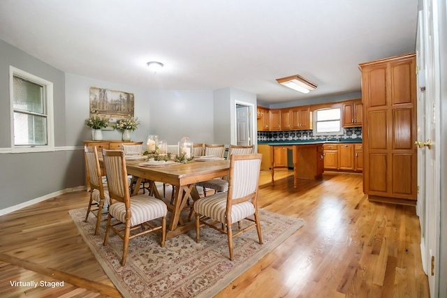 dining room featuring light wood-type flooring