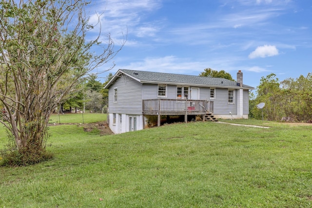 view of front of home with a deck and a front yard