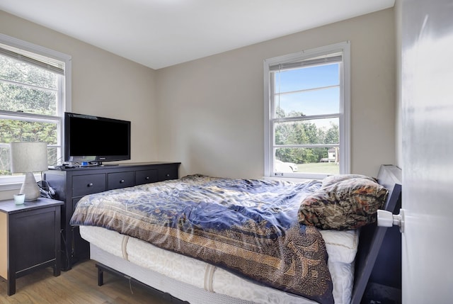 bedroom featuring light wood-type flooring